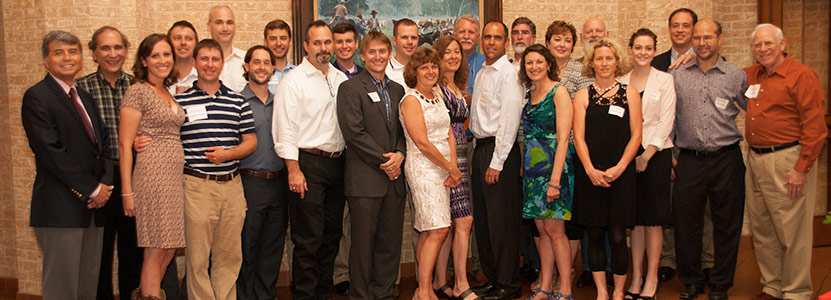 Phil Schmidt with students from the 1970s to 2012