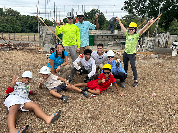 students celebrating at work site