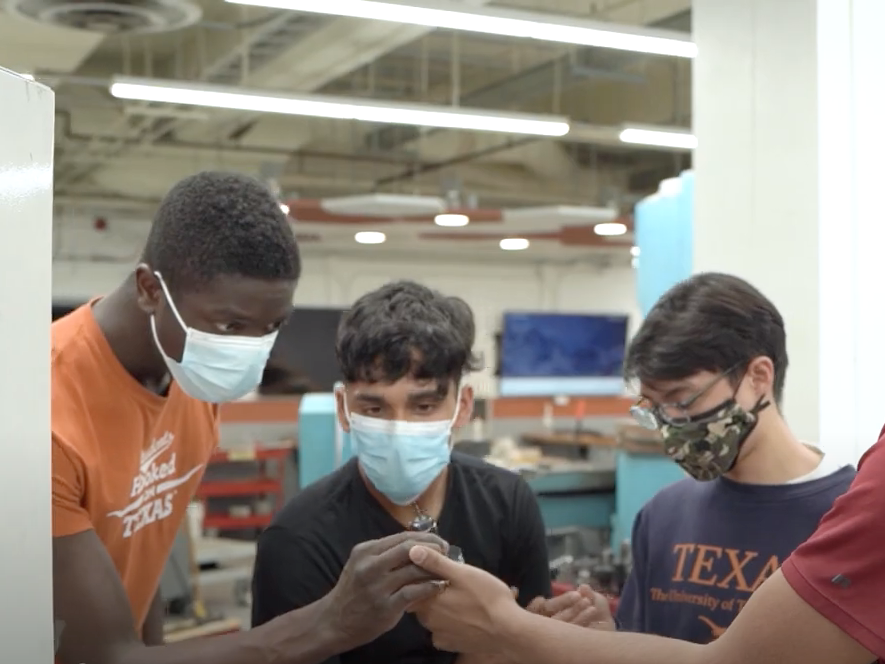 three students in masks